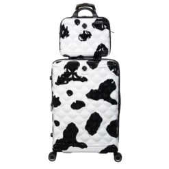 IT Luggage Indulging - 4pc Set (Moo Cow Print) 34 IT Luggage Indulging - 4pc Set (Moo Cow Print) -IT Luggage Store 33198 UK16 3039A08 16 3039A15Moocowblack whiterepeatprintSSFrontpanel25in